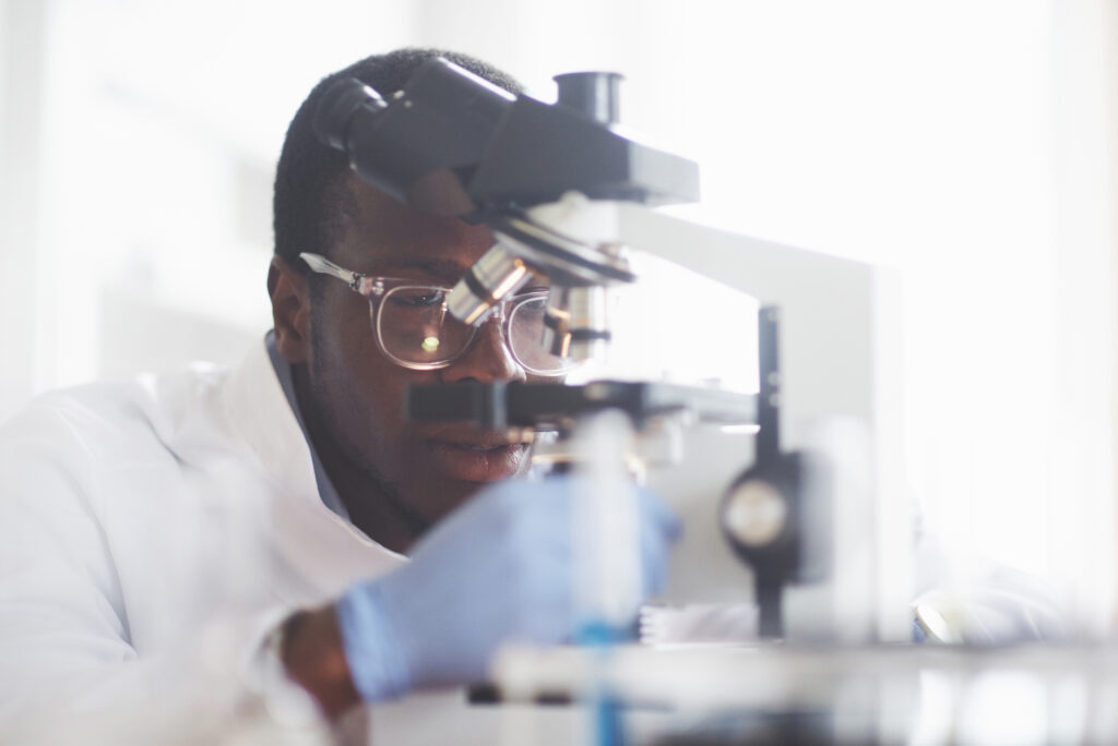 scientist microscope laboratory