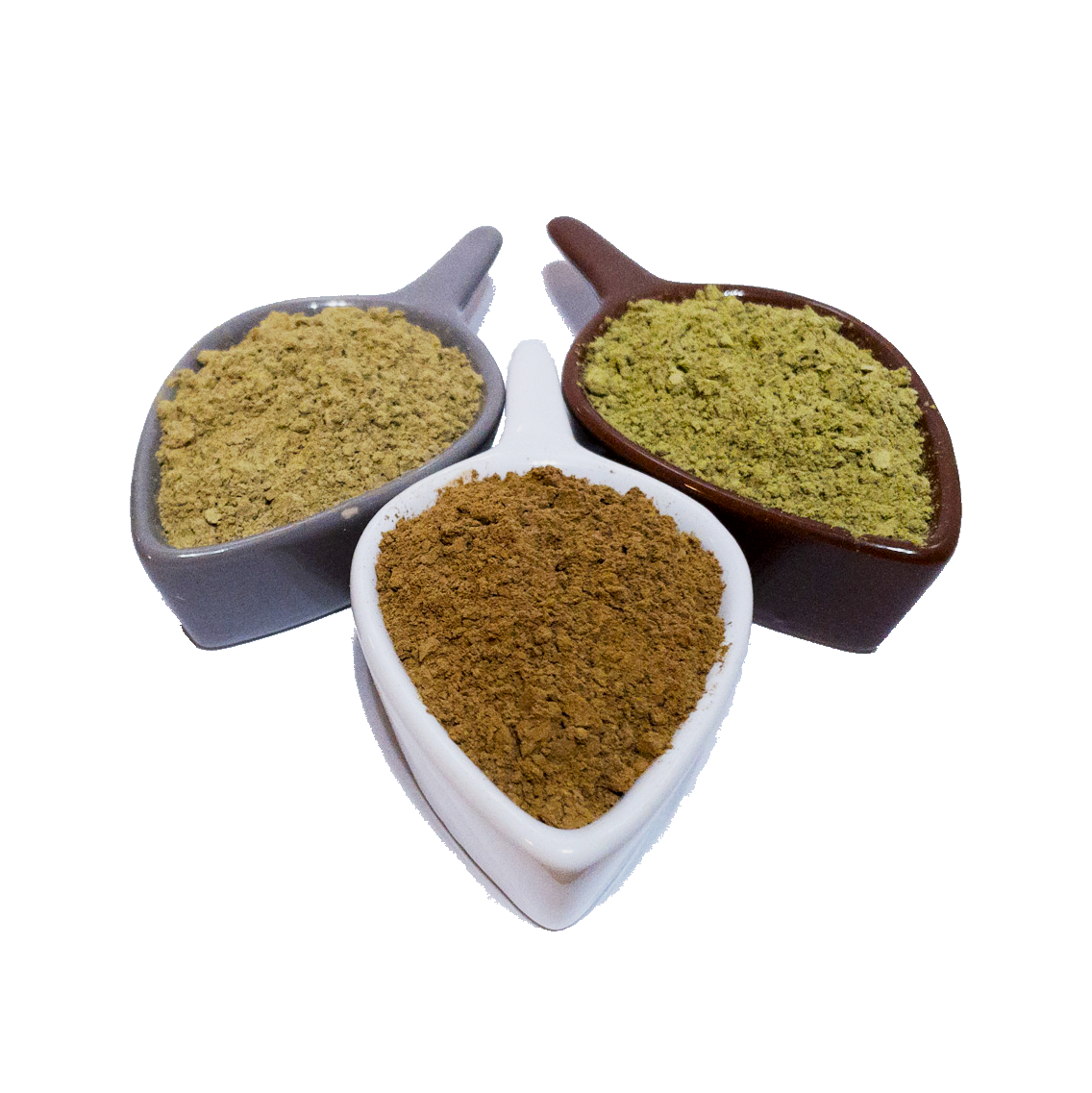 Three bowls of different spice powders arranged in leaf-shaped dishes, showcasing various colors and textures of the spices. The image highlights the rich diversity of spices used in cooking, enhancing flavor and aroma in dishes. Perfect for culinary enthusiasts and food bloggers.