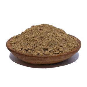 Brown powder in a wooden bowl, showcasing a natural spice or herb, ideal for culinary uses and health benefits.